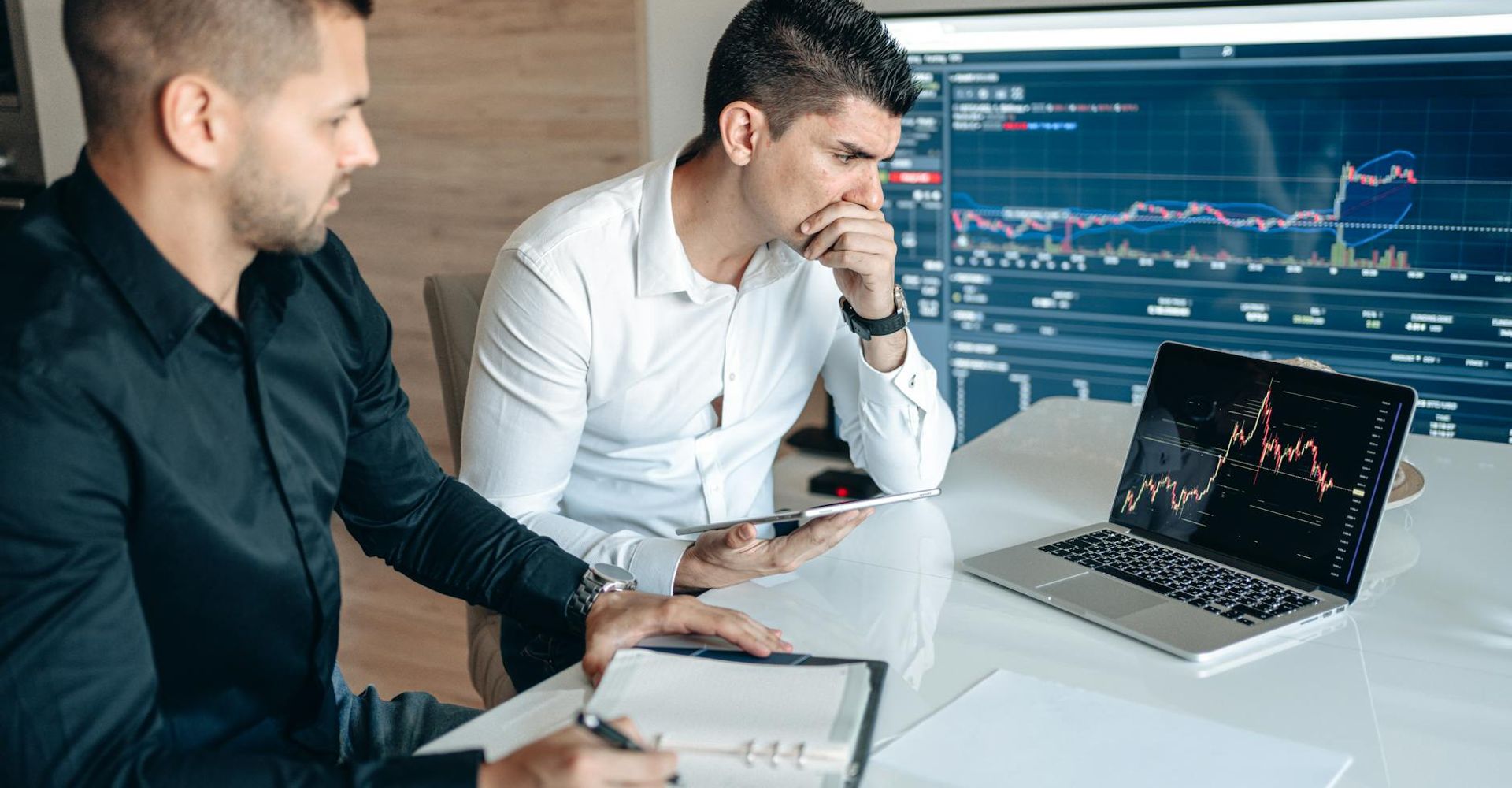 Business professionals analyzing financial data together